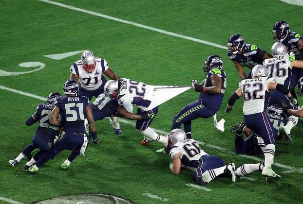 01 February 2015: Seattle Seahawks strong safety Kam Chancellor 31 (left) and defensive tackle Tony McDaniel 99 (right) haul down New England Patriots running back LeGarrette Blount 29 during the second half of Super Bowl XLIX between the Seattle Seahawks and the New England Patriots at University of Phoenix Stadium in Glendale, Az. The New England Patriots beat the Seattle Seahawks 28-24. NFL American Football Herren USA FEB 01 Super Bowl XLIX - Patriots v Seahawks Icon3171502012549 EDITORIAL USE ONLY