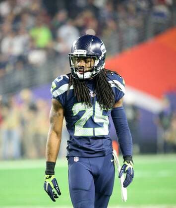 Cornerback RICHARD SHERMAN of The Seattle Seahawks walks dejectedly during Super Bowl XLIV against the New England Patriots at the University of Phoenix Stadium. NFL American Football Herren USA 2015 - Patriots Win Super Bowl XLIX NFL 2015 - Patriots Win Super Bowl XLIX  - ZUMAPERB