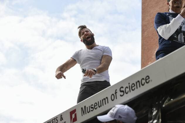 February 4, 2015 - Boston, Massachusetts, U.S. - New England Patriots wide receiver JULIAN EDELMAN (11) celebrates on the back of a duck boat during a parade held in Boston to celebrate the team s victory in Super Bowl XLIX. New England Patriots Victory Parade Through Boston - ZUMAc04_