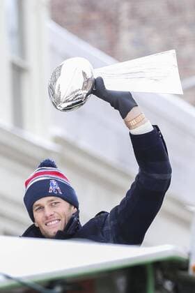 Feb. 4, 2015 - Boston, Massachusetts, U.S. - New England Patriots Quarterback TOM BRADY holds the Vince Lombardi Trophy in the back of a duck boat . New England Patriots Victory Parade Through Boston - ZUMAcz2_