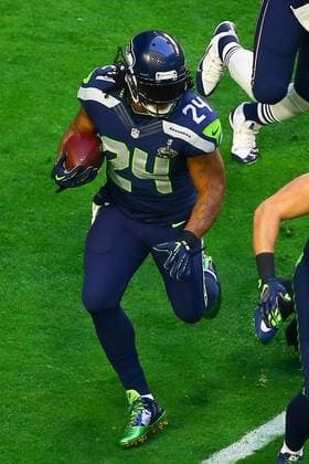 01 FEB 2015: Seattle Seahawks running back Marshawn Lynch (24) runs with the ball during the first quarter of Super Bowl XLIX being played at University of Phoenix Stadium. The New England Patriots defeat the Seattle Seahawks 28-24 in Super Bowl XLIX at University of Phoenix Stadium in Glendale Arizona. NFL American Football Herren USA FEB 01 Super Bowl XLIX - Patriots v Seahawks Icon020115344 EDITORIAL USE ONLY