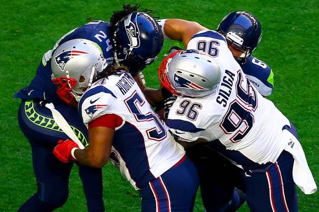 01 FEB 2015: Seattle Seahawks running back Marshawn Lynch (24) gets tackled by New England Patriots defensive tackle Sealver Siliga (96) and New England Patriots outside linebacker Dont a Hightower (54) during the first quarter of Super Bowl XLIX being played at University of Phoenix Stadium. The New England Patriots defeat the Seattle Seahawks 28-24 in Super Bowl XLIX at University of Phoenix Stadium in Glendale Arizona. NFL American Football Herren USA FEB 01 Super Bowl XLIX - Patriots v Seahawks Icon020115347 EDITORIAL USE ONLY