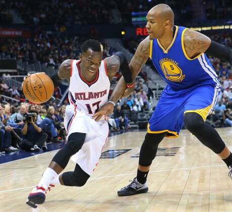 Feb. 6, 2015 - Atlanta, GA, USA - The Atlanta Hawks Dennis Schroder, left, drives against the Golden State Warriors Marreese Speights on Friday, Feb. 6, 2015, at Philips Arena in Atlanta. Golden State at Atlanta - ZUMAm67_