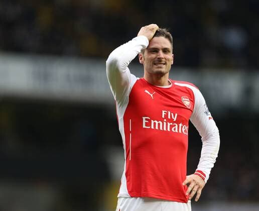 Arsenal s Olivier Giroud looks on dejected Barclays Premier League- Tottenham Hotspurs vs Arsenal - White Hart Lane - England - 7th February 2015 - Picture David Klein Sportimage EDITORIAL USE ONLY. No use with unauthorised audio, video, data, fixture lists, club league logos or live services. Online in-match use limited to 120 images, no video emulation. No use in betting, games or single club league player publications.