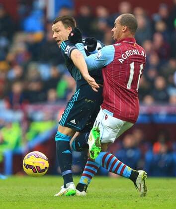 Gabriel Agbonlahor of Aston Villa challenges John Terry of Chelsea - Aston Villa vs. Chelsea - Barclay s Premier League - Villa Park - Birmingham - 07 02 2015 Pic Philip Oldham Sportimage EDITORIAL USE ONLY. No use with unauthorised audio, video, data, fixture lists, club league logos or live services. Online in-match use limited to 120 images, no video emulation. No use in betting, games or single club league player publications.
