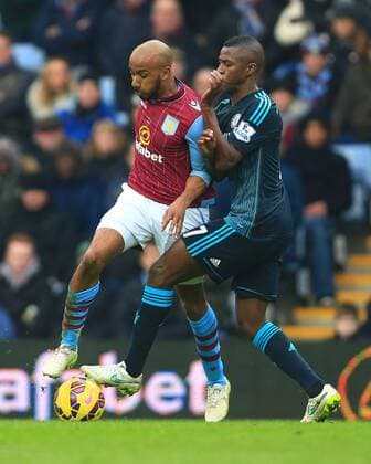 Ramires of Chelsea tackles Fabian Delph of Aston Villa - Aston Villa vs. Chelsea - Barclay s Premier League - Villa Park - Birmingham - 07 02 2015 Pic Philip Oldham Sportimage EDITORIAL USE ONLY. No use with unauthorised audio, video, data, fixture lists, club league logos or live services. Online in-match use limited to 120 images, no video emulation. No use in betting, games or single club league player publications.