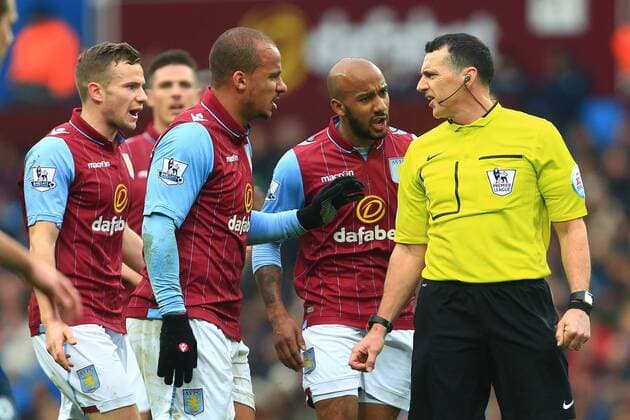 Villa question referee Neil Swarbrick - Aston Villa vs. Chelsea - Barclay s Premier League - Villa Park - Birmingham - 07 02 2015 Pic Philip Oldham Sportimage EDITORIAL USE ONLY. No use with unauthorised audio, video, data, fixture lists, club league logos or live services. Online in-match use limited to 120 images, no video emulation. No use in betting, games or single club league player publications.