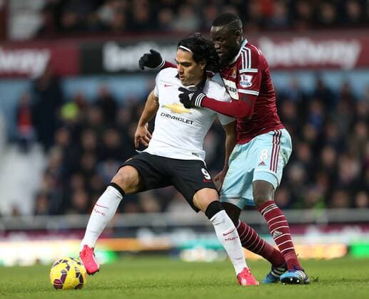 Aktuell Fußball, England, Premier League, West Ham United - Manchester United West Ham s Cheikhou Kouyate tussles with Manchester United ManU s Radamel Falcao Barclays Premier League- West Ham United vs Manchester United - Upton Park - England - 8th February 2015 - Picture David Klein Sportimage EDITORIAL USE ONLY. No use with unauthorised audio, video, data, fixture lists, club league logos or live services. Online in-match use limited to 120 images, no video emulation. No use in betting, games or single club league player publications.