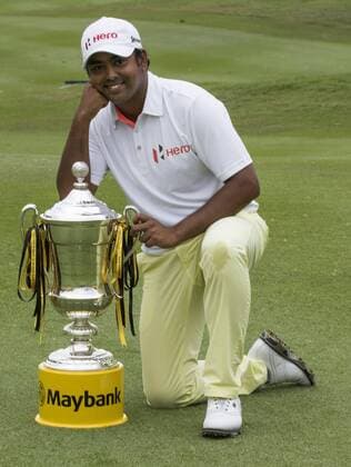 Feb. 8, 2015 - Kuala Lumpur, Malaysia - Anirban Lahiri of India poses with the trophy after won the Maybank Malaysia Open golf tournament in Kuala Lumpur, Malaysia, 8 February 2015. Golf Malaysia Open 2015  - ZUMAn230