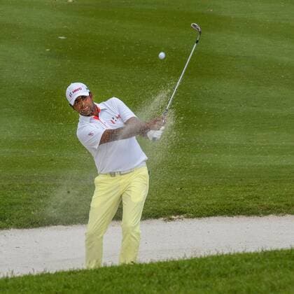Feb. 8, 2015 - Kuala Lumpur, Malaysia - ANIRBAN LAHIRI of India hits out of a sand trap onto the 18th green at the Maybank Malaysia Open golf tournament. Lahiri won with a 16-under 272. Golf 2015 - Malaysia Open  - ZUMA