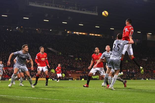 Chris Smalling of Manchester United ManU scores his sides second goal - Manchester United vs. Burnley - Barclay s Premier League - Old Trafford - Manchester - 11 02 2015 Pic Philip Oldham Sportimage EDITORIAL USE ONLY. No use with unauthorised audio, video, data, fixture lists, club league logos or live services. Online in-match use limited to 120 images, no video emulation. No use in betting, games or single club league player publications.