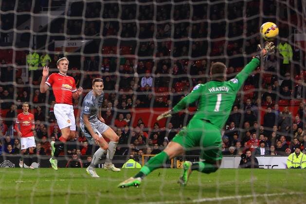 James Wilson of Manchester United ManU fires a shot in to the side netting - Manchester United vs. Burnley - Barclay s Premier League - Old Trafford - Manchester - 11 02 2015 Pic Philip Oldham Sportimage EDITORIAL USE ONLY. No use with unauthorised audio, video, data, fixture lists, club league logos or live services. Online in-match use limited to 120 images, no video emulation. No use in betting, games or single club league player publications.