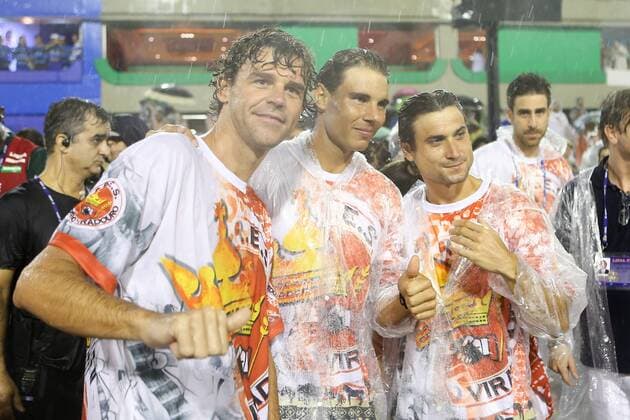 Gustavo Kuerten (L), Rafael Nadal (C) and David Ferrer (R) are seen prior to the performance of Special Groups of Samba Parade at the Sambadrome in Rio de Janeiro, Brazil, Feb. 15, 2015. XuxZijian 