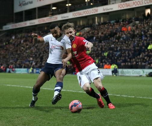 Chris Humphrey of Preston North End holds off Luke Shaw of Manchester United ManU - FA Cup Fifth Round - Preston North End vs Manchester Utd - Deepdale Stadium - Preston - England - 16th February 2015 - Picture Simon Bellis Sportimage EDITORIAL USE ONLY. No use with unauthorised audio, video, data, fixture lists, club league logos or live services. Online in-match use limited to 120 images, no video emulation. No use in betting, games or single club league player publications.