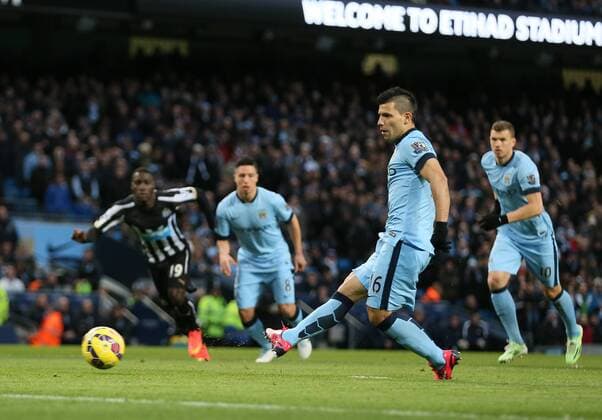 Sergio Kun Aguero of Manchester City scores from the penalty spot - Barclays Premier League - Manchester City vs Newcastle Utd - Etihad Stadium - Manchester - England - 21st February 2015 - Picture Simon Bellis Sportimage EDITORIAL USE ONLY. No use with unauthorised audio, video, data, fixture lists, club league logos or live services. Online in-match use limited to 120 images, no video emulation. No use in betting, games or single club league player publications.