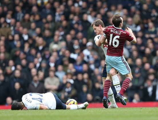 Tottenham s Jan Vertonghen tussles with West Ham s Mark Noble Barclays Premier League - Tottenham Hotspur vs West Ham - White Hart Lane - England - 22nd February 2015 - Picture David Klein Sportimage EDITORIAL USE ONLY. No use with unauthorised audio, video, data, fixture lists, club league logos or live services. Online in-match use limited to 120 images, no video emulation. No use in betting, games or single club league player publications.