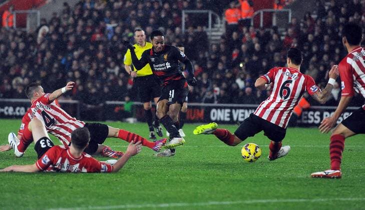 Raheem Sterling of Liverpool scores his goal to make it 2-0 - Barclays Premier League - Southampton vs Liverpool - St Mary s Stadium - Southampton - England - 22nd February 2015 - Pic Robin Parker Sportimage EDITORIAL USE ONLY. No use with unauthorised audio, video, data, fixture lists, club league logos or live services. Online in-match use limited to 120 images, no video emulation. No use in betting, games or single club league player publications. DSC_7354.JPG