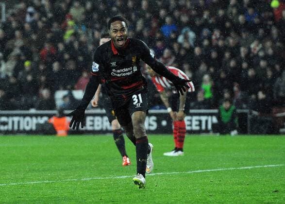 Raheem Sterling of Liverpool celebrates scoring his goal to make it 2-0 - Barclays Premier League - Southampton vs Liverpool - St Mary s Stadium - Southampton - England - 22nd February 2015 - Pic Robin Parker Sportimage EDITORIAL USE ONLY. No use with unauthorised audio, video, data, fixture lists, club league logos or live services. Online in-match use limited to 120 images, no video emulation. No use in betting, games or single club league player publications. DSC_7354.JPG