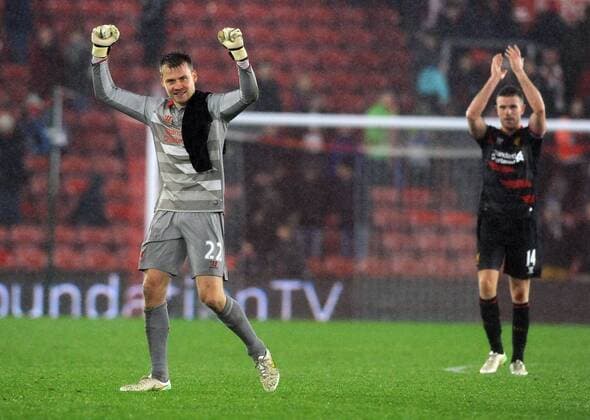 Liverpool goalkeeper Simon Mignolet thanks the fans at the end of the game - Barclays Premier League - Southampton vs Liverpool - St Mary s Stadium - Southampton - England - 22nd February 2015 - Pic Robin Parker Sportimage EDITORIAL USE ONLY. No use with unauthorised audio, video, data, fixture lists, club league logos or live services. Online in-match use limited to 120 images, no video emulation. No use in betting, games or single club league player publications. DSC_7354.JPG