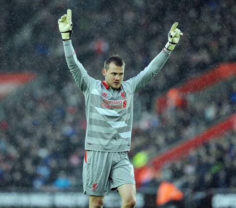 Liverpool goalkeeper Simon Mignolet celebrates after Liverpool s first goal - Barclays Premier League - Southampton vs Liverpool - St Mary s Stadium - Southampton - England - 22nd February 2015 - Pic Robin Parker Sportimage EDITORIAL USE ONLY. No use with unauthorised audio, video, data, fixture lists, club league logos or live services. Online in-match use limited to 120 images, no video emulation. No use in betting, games or single club league player publications. DSC_7354.JPG