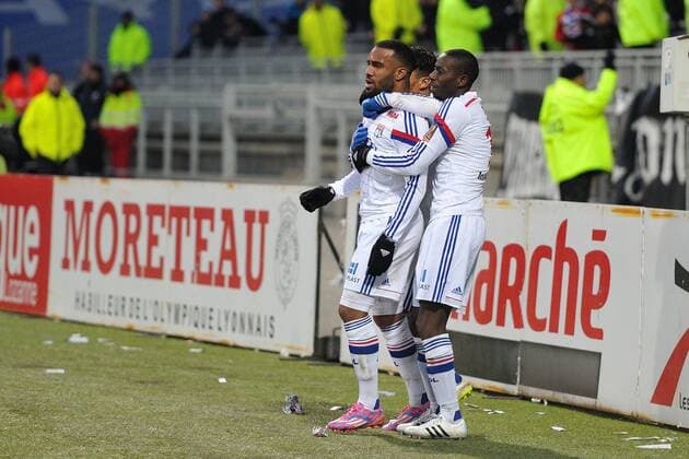 Joie de Nabil Fekir et Alexandre Lacazette et Mouhamadou Dabo (lyon) FOOTBALL : Lyon vs Nantes - Ligue 1 - 22 02 2015 FredericChambert Panoramic 