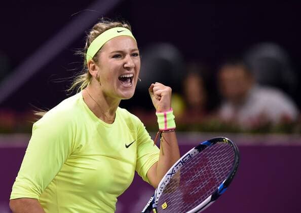 (150224) -- DOHA, Feb. 23, 2015 -- Victoria Azarenka of Belarus celebrates after the first round match against AngeliqueKerber of Germany in the WTA Tennis Damen Qatar Open tennis tournament in Doha, Qatar, Feb. 23, 2015. Victoria Azarenka won 2-0. ) (SP)QATAR-DOHA-TENNIS-WTA ChenxShaojin 