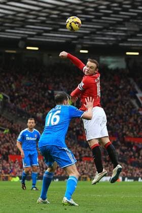 Wayne Rooney of Manchester United ManU wins a header over John O Shea of Sunderland - Manchester United (ManU) vs. AFC Sunderland - Barclay s Premier League - Old Trafford - Manchester - 28 02 2015 - EDITORIAL USE ONLY. No use with unauthorised audio, video, data, fixture lists, club league logos or live services. Online in-match use limited to 120 images, no video emulation. No use in betting, games or single club league player publications.