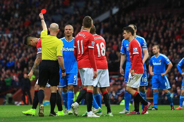 Wes Brown of Sunderland is shown a red card - Manchester United ManU vs. Sunderland - Barclay s Premier League - Old Trafford - Manchester - 28 02 2015 - EDITORIAL USE ONLY. No use with unauthorised audio, video, data, fixture lists, club league logos or live services. Online in-match use limited to 120 images, no video emulation. No use in betting, games or single club league player publications.