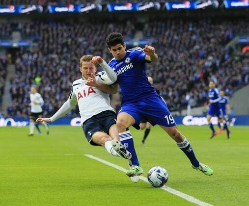 Chelsea s Diego Costa tussles with Tottenham s Eric Dier League Cup Final - Chelsea vs Tottenham Hotspur - Wembley Stadium - England - 1st March 2015 - Picture David Klein Sportimage EDITORIAL USE ONLY. No use with unauthorised audio, video, data, fixture lists, club league logos or live services. Online in-match use limited to 120 images, no video emulation. No use in betting, games or single club league player publications.
