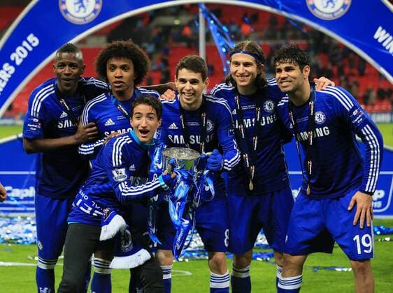 Chelsea s Jose Mourinho s son celebrates with the trophy with Oscar League Cup Final - Chelsea vs Tottenham Hotspur - Wembley Stadium - England - 1st March 2015 - Picture David Klein Sportimage EDITORIAL USE ONLY. No use with unauthorised audio, video, data, fixture lists, club league logos or live services. Online in-match use limited to 120 images, no video emulation. No use in betting, games or single club league player publications.