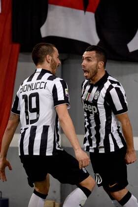 02.03.2015. Rome, Italy. Serie A Football. AS Roma versus Juventus. Carlos Tevez celebrates after he scored the 0-1 goal for Juventus with Leonardo Bonucci xGiuseppexMaffiax  ActionPlus11602073