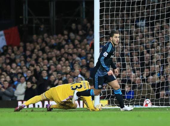 Chelsea s Eden Hazard celebrates scoring his sides opening goal Barclays Premier League - - West Ham United vs FC Chelsea United - Upton Park - England - 4th March 2015 - Picture DavidxKlein Sportimage EDITORIAL USE ONLY. No use with unauthorised audio, video, data, fixture lists, club league logos or live services. Online in-match use limited to 120 images, no video emulation. No use in betting, games or single club league player publications.