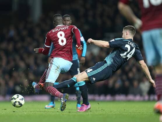 Chelsea s Gary Cahill goes in for a strong challenge on West Ham s Cheikhou Kouyate Barclays Premier League - - West Ham United vs FC Chelsea United - Upton Park - England - 4th March 2015 - Picture DavidxKlein Sportimage EDITORIAL USE ONLY. No use with unauthorised audio, video, data, fixture lists, club league logos or live services. Online in-match use limited to 120 images, no video emulation. No use in betting, games or single club league player publications.