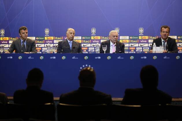 Rio de Janeiro RJ - Brazilian team coach Carlos Dunga calls the player for the next two friendly matches of Brazil, March 5 in the auditorium of the headquarters of the CBF, in Barra da Tijuca in Rio de Janeiro. Here pictured with CBF president Jose Maria Marin, Marco Del Nero and Gilmar Rinaldi (from right).  MarlonxFalcao