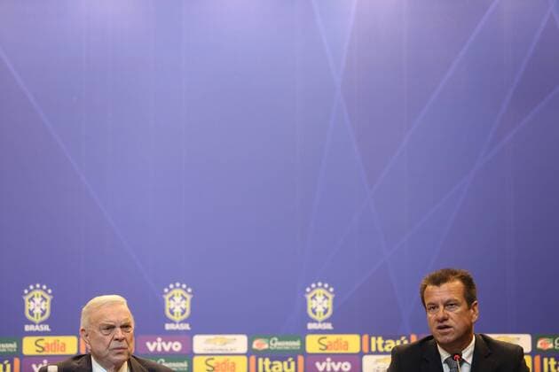 Rio de Janeiro RJ - Brazilian team coach Carlos Dunga calls the player for the next two friendly matches of Brazil, March 5 in the auditorium of the headquarters of the CBF, in Barra da Tijuca in Rio de Janeiro. Here pictured with CBF president Jose Maria Marin.  MarlonxFalcao