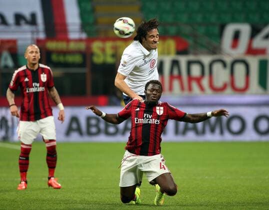 07.03.2015. San Siro stadium, Milan, Italy. Serie A football. AC Milan versus Hellas Verona. Luca Toni against Sulley Muntari xPaoloxNuccix  ActionPlus11603358