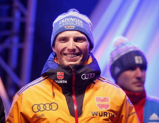 BIATHLON - IBU WC Kontiolahti 2015 KONTIOLAHTI,FINLAND,08.MAR.15 - BIATHLON - IBU World Championships, 10km sprint, men, Medal Plaza, award ceremony. Image shows Erik Lesser (GER).