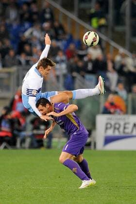 09.03.2015. Rome, Italy. Serie A Football. Lazio versus Fiorentina. Miroslav Klose (Laz) is upended by Manuel Pasqual (Fio) xGiuseppexMaffiax  ActionPlus11603711