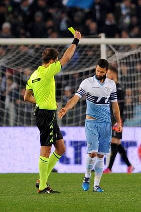 09.03.2015. Rome, Italy. Serie A Football. Lazio versus Fiorentina. Antonio Candreva gets yellow card after over-celebrating the goal for 2-0 for Lazio xGiuseppexMaffiax  ActionPlus11603764