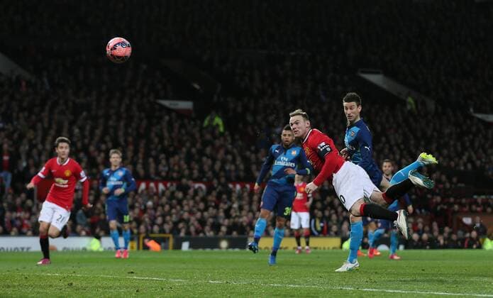 Wayne Rooney of Manchester United ManU heads the equalising goal 1-1 - FA Cup Sixth Round - Manchester Utd vs Arsenal - Old Trafford Stadium - Manchester - England - 9th March 2015 - Picture Simon Bellis Sportimage EDITORIAL USE ONLY. No use with unauthorised audio, video, data, fixture lists, club league logos or live services. Online in-match use limited to 120 images, no video emulation. No use in betting, games or single club league player publications.