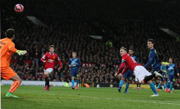 Wayne Rooney of Manchester United ManU heads the equalising goal 1-1 - FA Cup Sixth Round - Manchester Utd vs Arsenal - Old Trafford Stadium - Manchester - England - 9th March 2015 - Picture Simon Bellis Sportimage EDITORIAL USE ONLY. No use with unauthorised audio, video, data, fixture lists, club league logos or live services. Online in-match use limited to 120 images, no video emulation. No use in betting, games or single club league player publications.