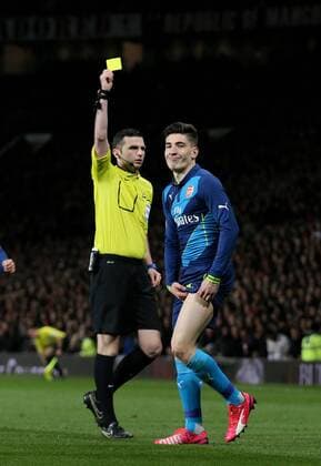 Hector Bellerin of Arsenal receives a yellow card - FA Cup Sixth Round - Manchester Utd vs Arsenal - Old Trafford Stadium - Manchester - England - 9th March 2015 - Picture Simon Bellis Sportimage EDITORIAL USE ONLY. No use with unauthorised audio, video, data, fixture lists, club league logos or live services. Online in-match use limited to 120 images, no video emulation. No use in betting, games or single club league player publications.