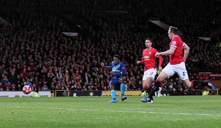 Danny Welbeck of Arsenal scores the second goal 1-2 - FA Cup Sixth Round - Manchester Utd vs Arsenal - Old Trafford Stadium - Manchester - England - 9th March 2015 - Picture Simon Bellis Sportimage EDITORIAL USE ONLY. No use with unauthorised audio, video, data, fixture lists, club league logos or live services. Online in-match use limited to 120 images, no video emulation. No use in betting, games or single club league player publications.