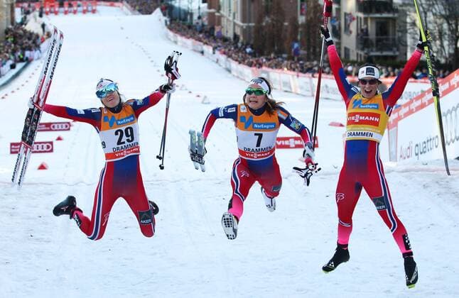 NORDIC SKIING - FIS WC Drammen DRAMMEN,NORWAY,11.MAR.15 - NORDIC SKIING, CROSS COUNTRY SKIING - FIS World Cup, sprint, ladies. Image shows the rejoicing of Heidi Weng, Maiken Caspersen Falla and Marit Bjoergen (NOR).