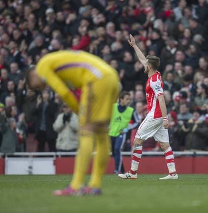 14.03.2015. London, England. Barclays Premier League. Arsenal versus West Ham. Arsenal s Aaron Ramsey celebrates his goal which made it 2-0. xNigelxCookex  ActionPlus11604842