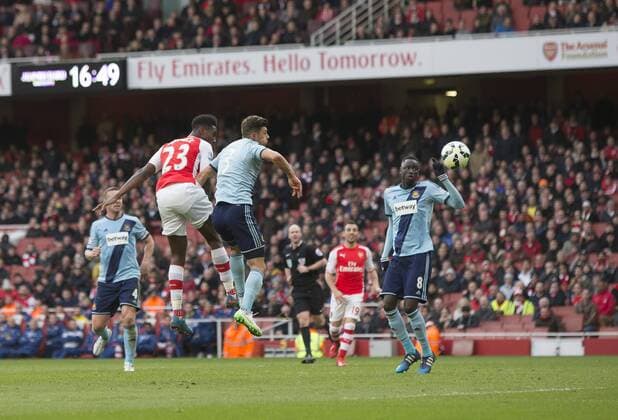 14.03.2015. London, England. Barclays Premier League. Arsenal versus West Ham. Arsenal s Danny Wellbeck gets his header on target but it was well saved by West Ham United s Adri& xe1;n. xNigelxCookex  ActionPlus11604923
