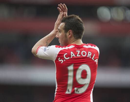 14.03.2015. London, England. Barclays Premier League. Arsenal versus West Ham. Arsenal s Santi Cazorla who came on late in the second half applauds the supporters at the final whistle. xNigelxCookex  ActionPlus11604925
