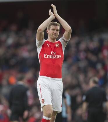 14.03.2015. London, England. Barclays Premier League. Arsenal versus West Ham. Arsenal s Per Mertesacker at the final whistle. xNigelxCookex  ActionPlus11604926
