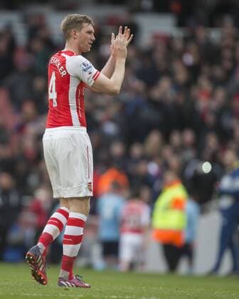 14.03.2015. London, England. Barclays Premier League. Arsenal versus West Ham. Arsenal s Per Mertesacker at the final whistle. xNigelxCookex  ActionPlus11604927