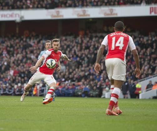 14.03.2015. London, England. Barclays Premier League. Arsenal versus West Ham. Arsenal s Aaron Ramsey has a shot on target. xNigelxCookex  ActionPlus11604929